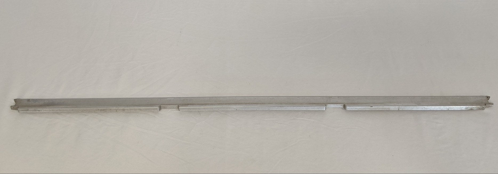 Used Freightliner FLD Classic 'Old Style'  Grille Bar- P/N 18-21483-001