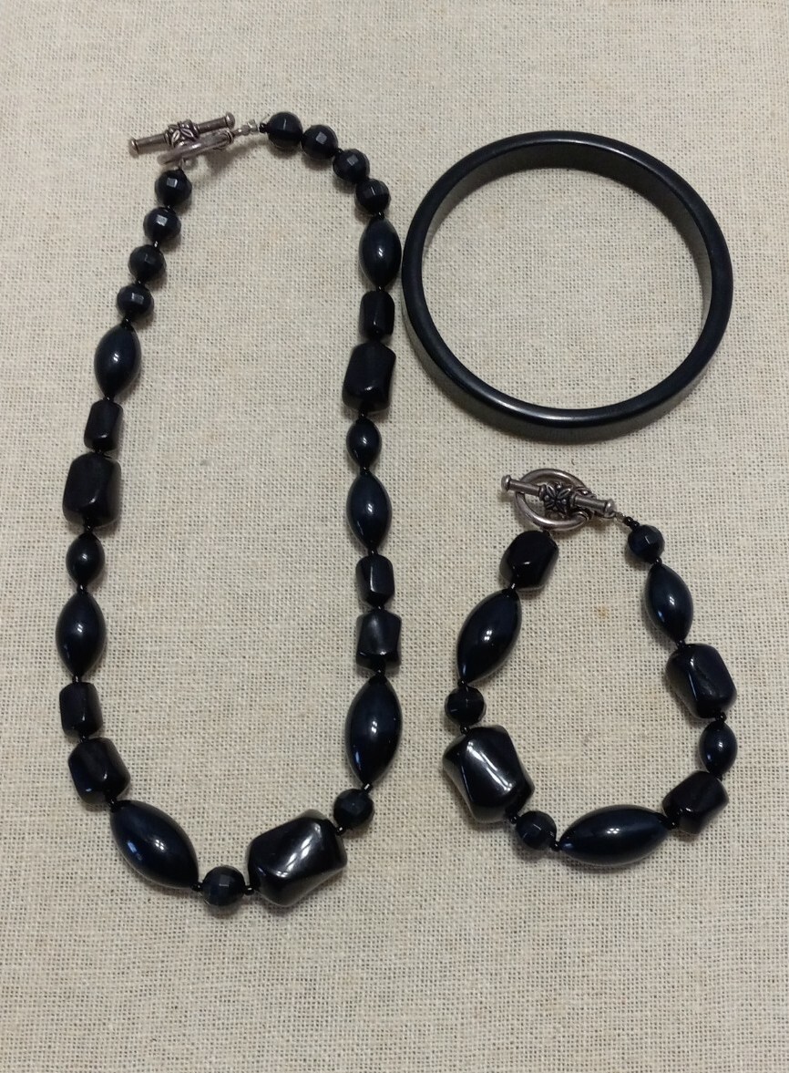 Handcrafted Black Beaded Necklace And Bracelet And A Black Acrylic Bangle