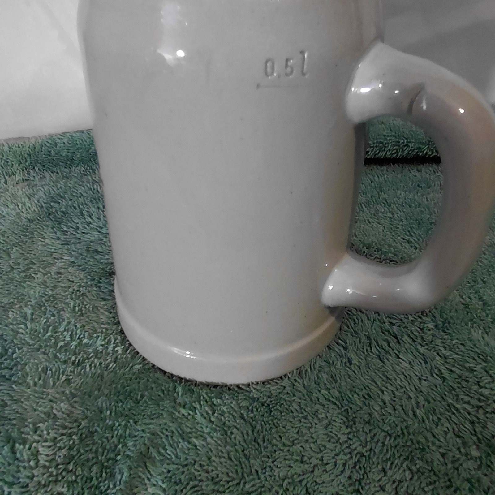White Ceramic Beer Stein with Blue Crest
