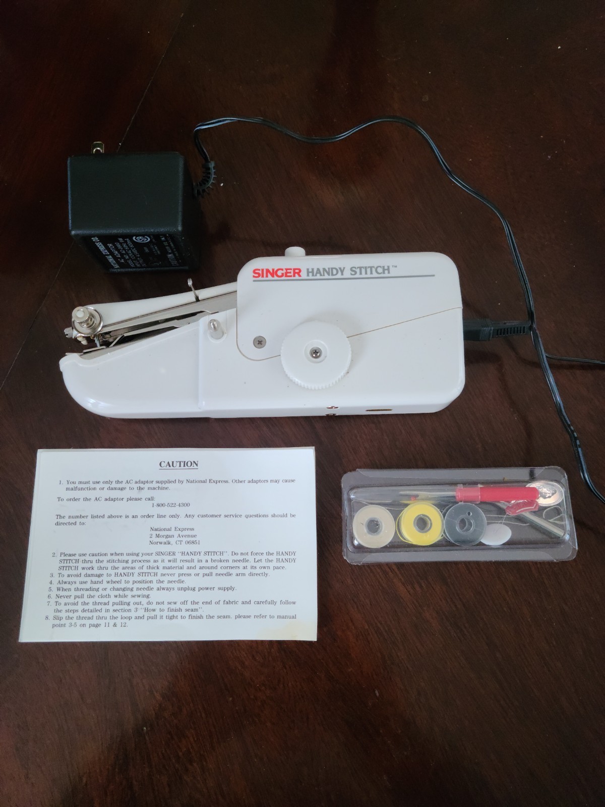 Singer Handy Stitch Mechanical Sewing Machine (with cord, still works great)