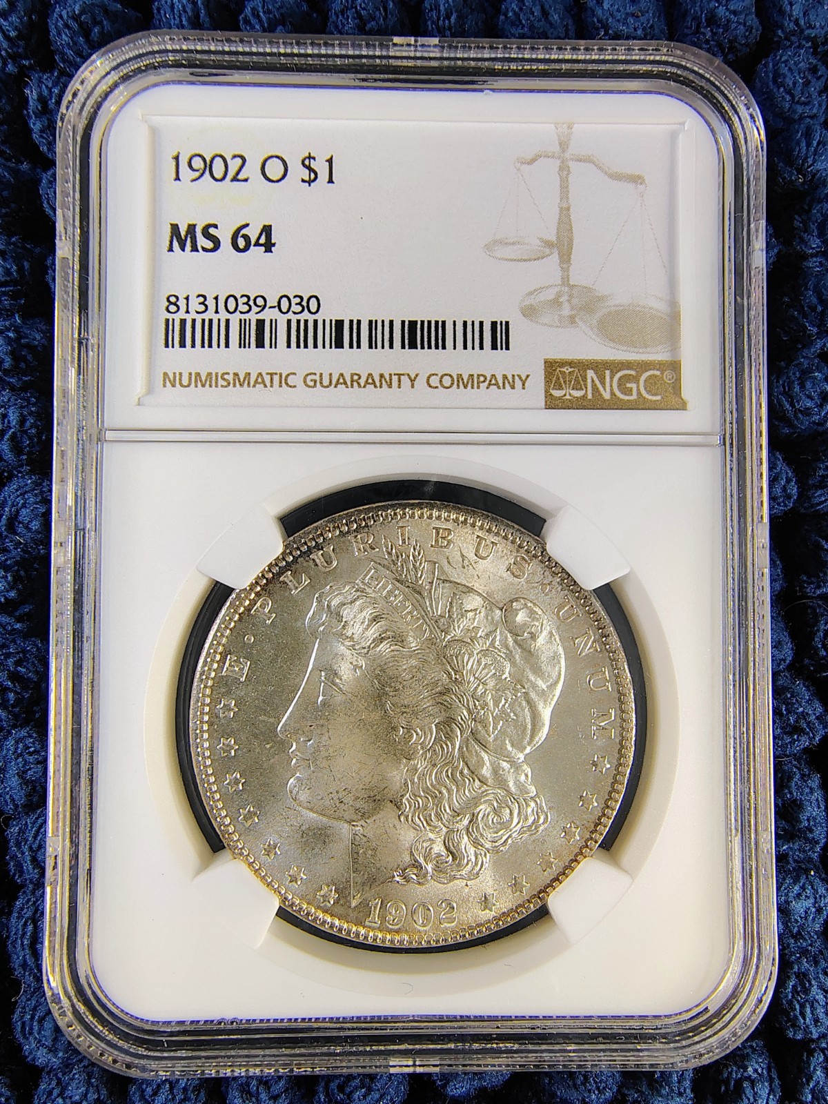 1902-O Morgan Silver Dollar - New Orleans -90% Silver- NGC MS 64 - Reverse Toner