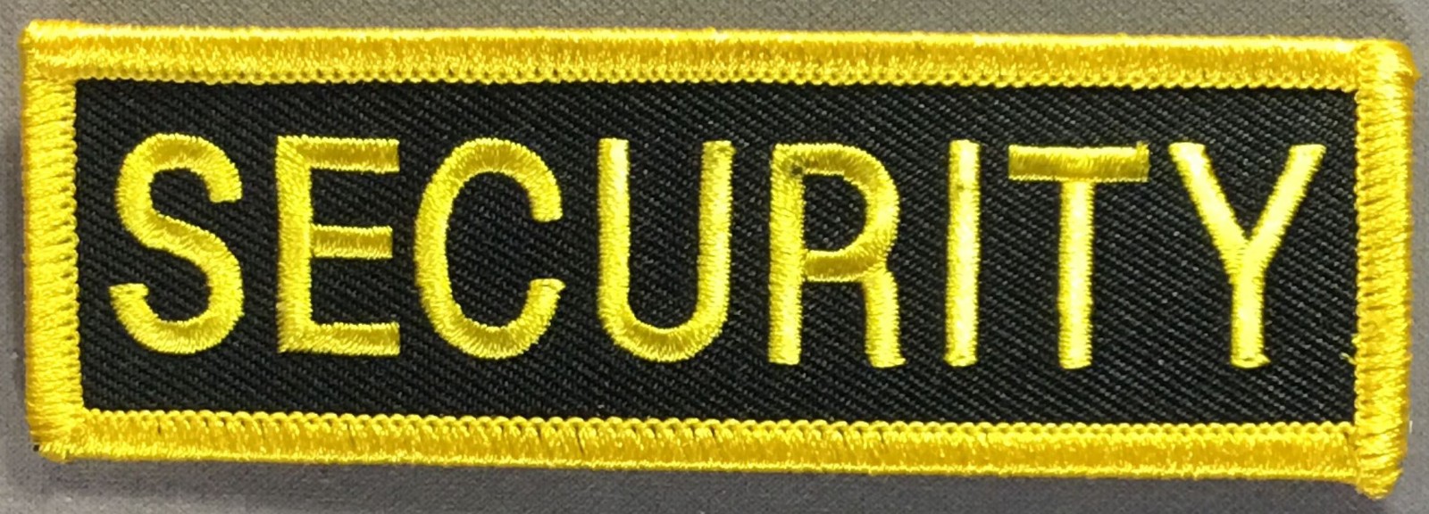 Security gold on black patch