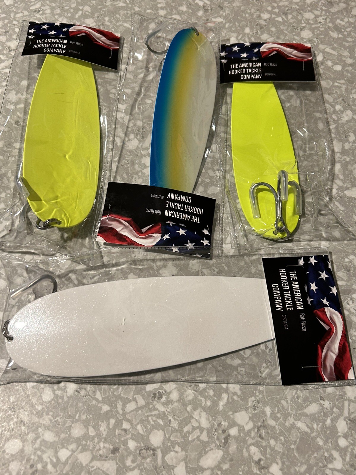 9” 5 ounce sparkle white Flutter Spoon￼ striped bass striper