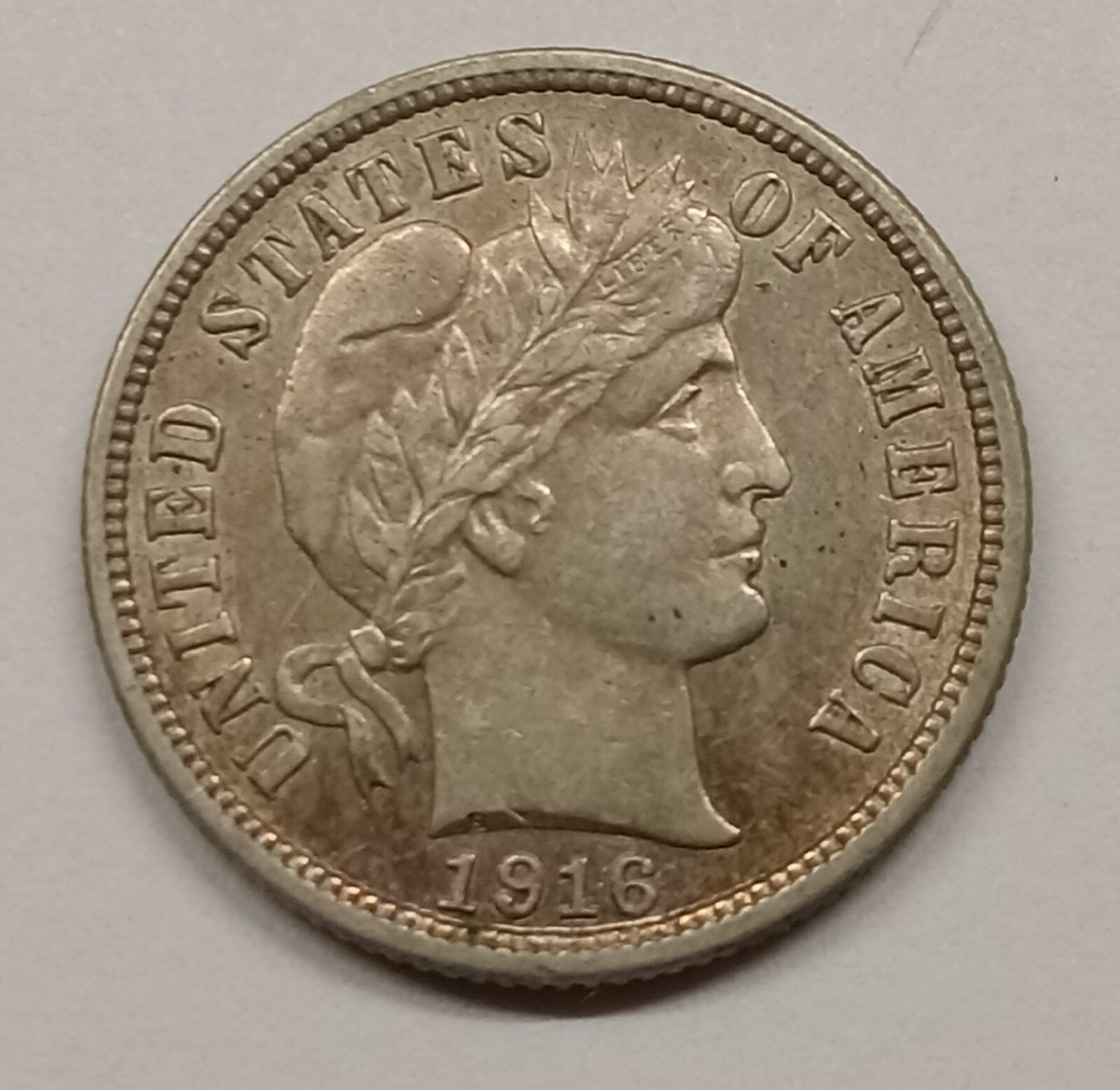 1916 Barber Silver Dime. AU nice surfaces.