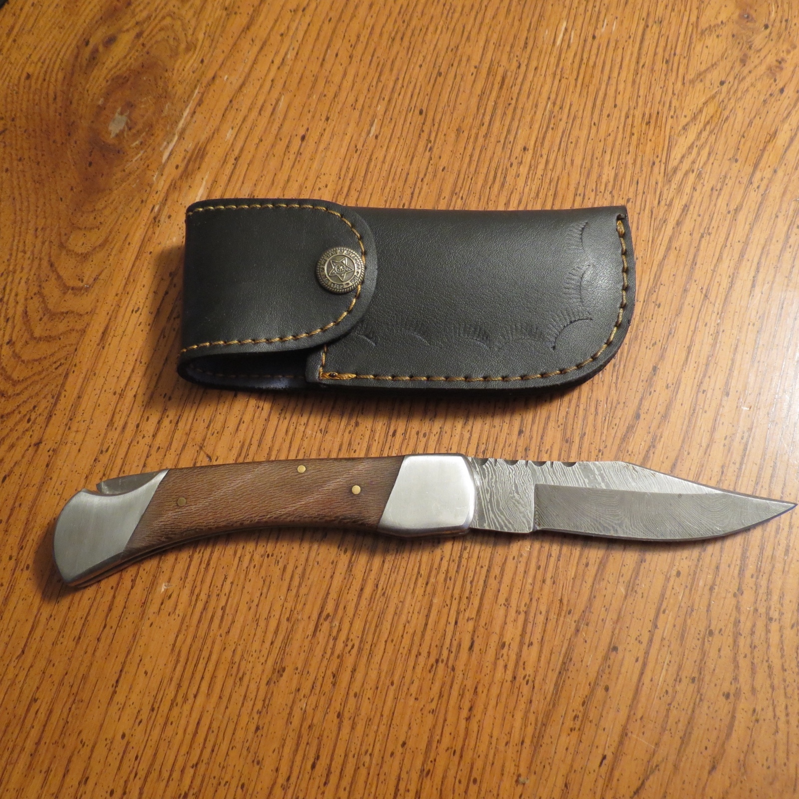 Big Damascus folder with walnut color wood handles  & leather sheath hand made