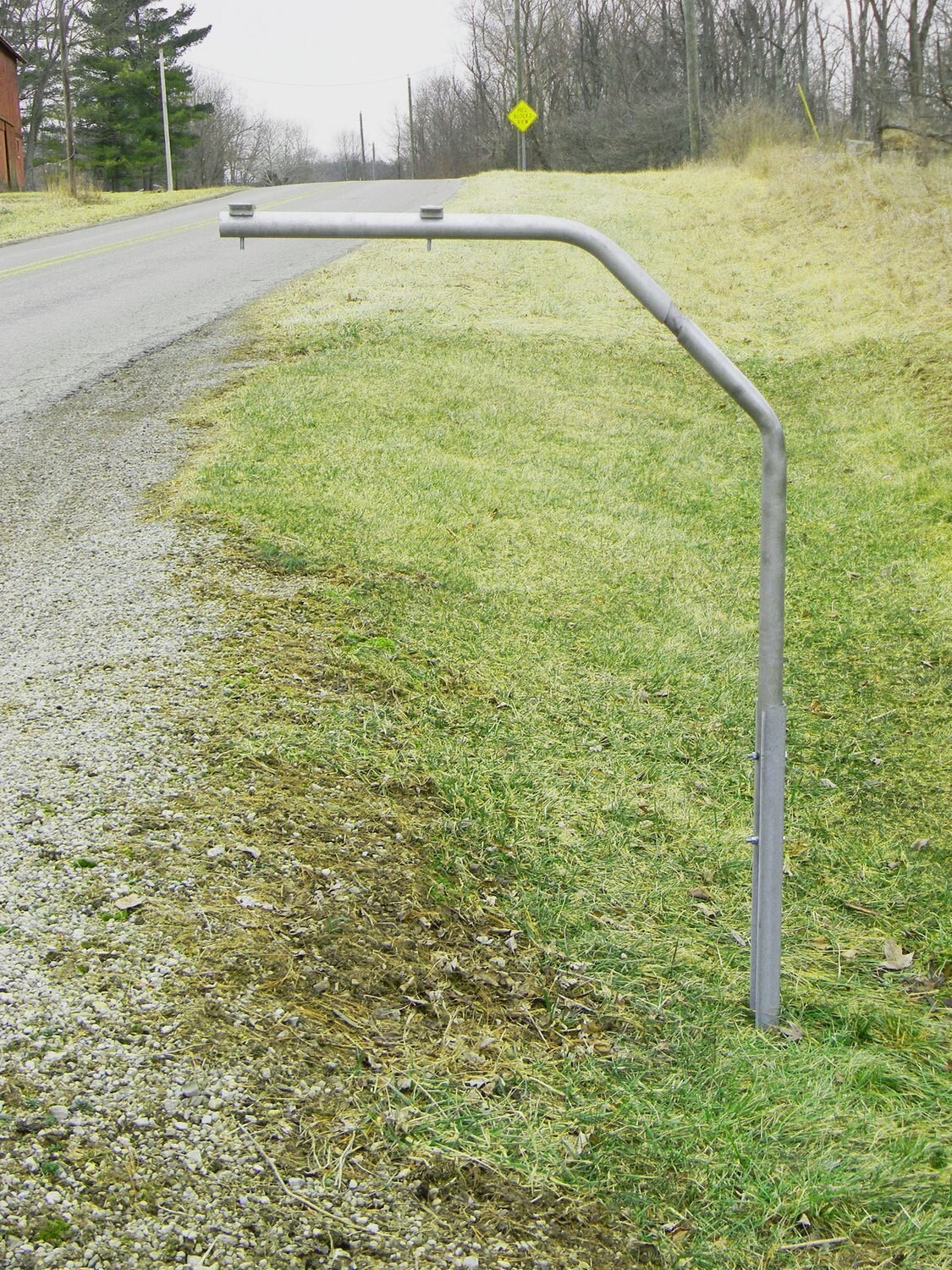 Snowplow and vandal resistant, 36" long arm, rotating mailbox post system. 