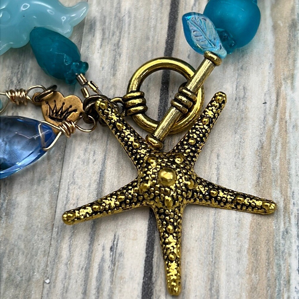 Adorned Crown Assemblage beaches & butterflies dragonfly starfish bracelet