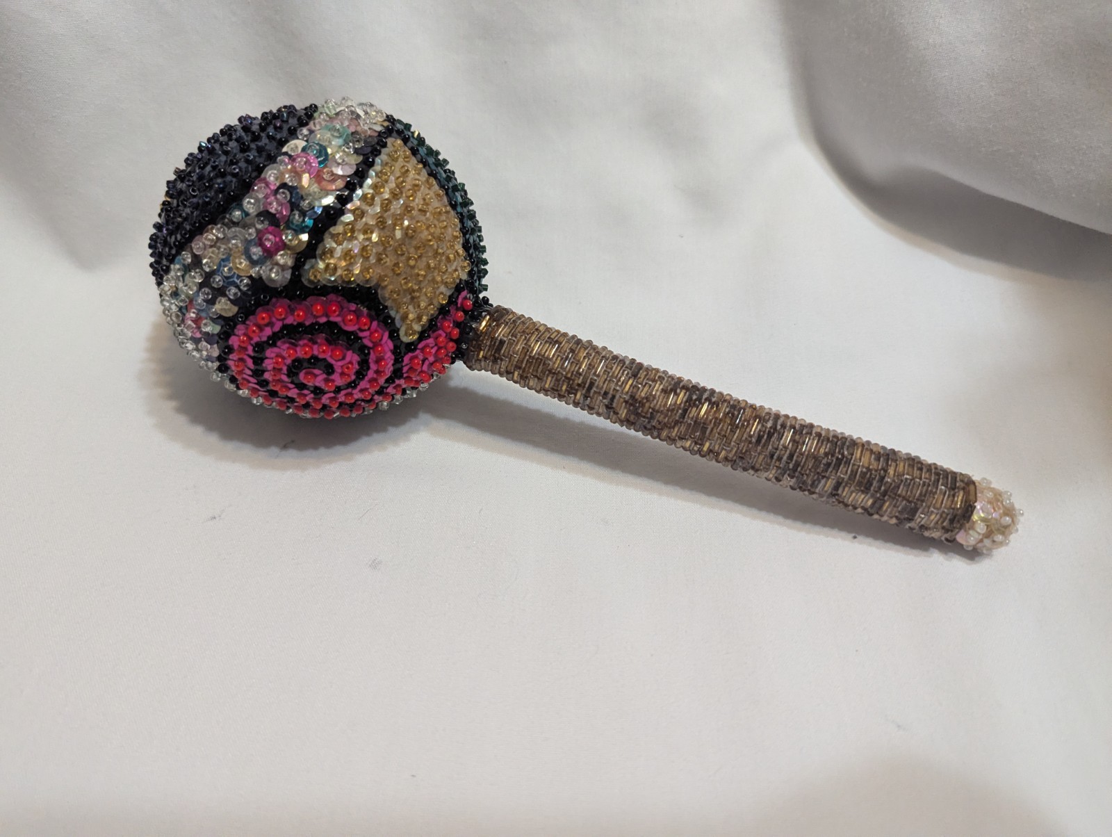 Colorful sequined voodoo maraca rattle - please read