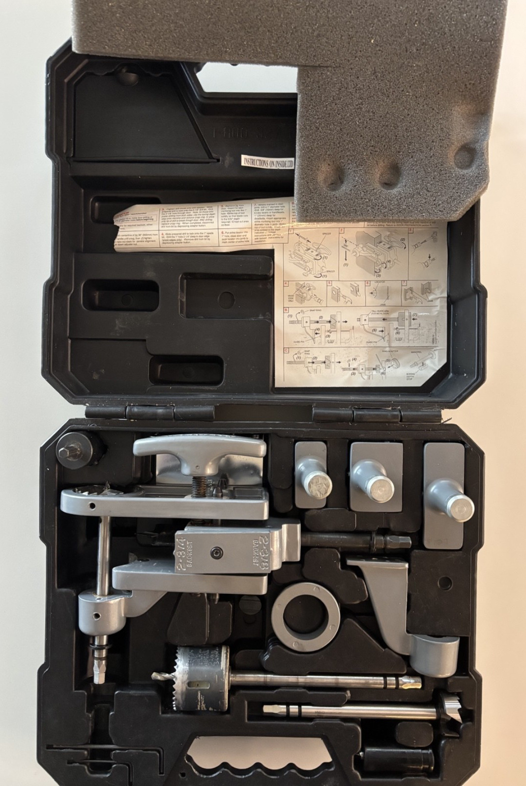 Original Kwikset lock installation jig with carry case.