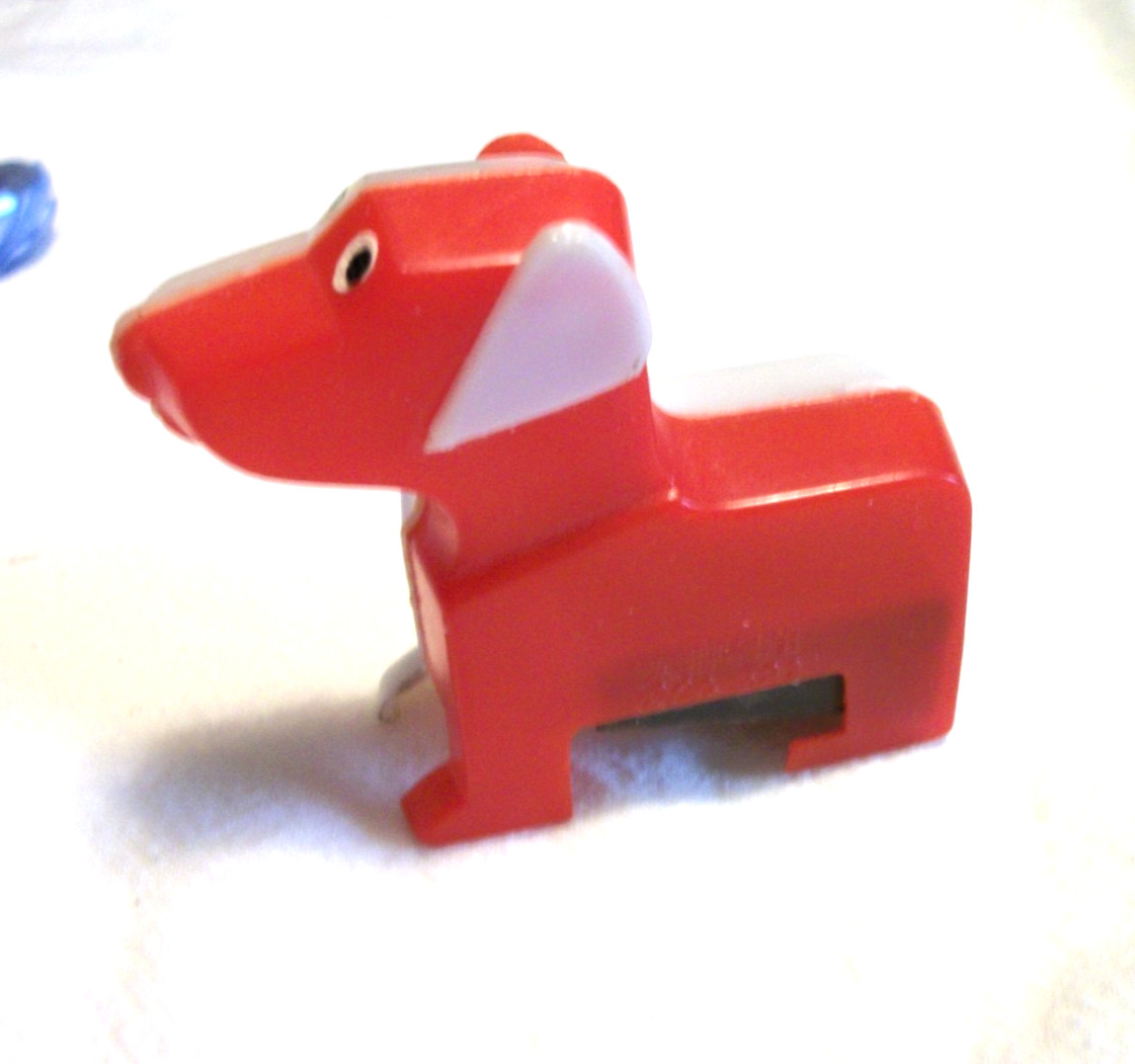 TINY FIGURAL PENCIL SHARPENER RED AND WHITE DOG