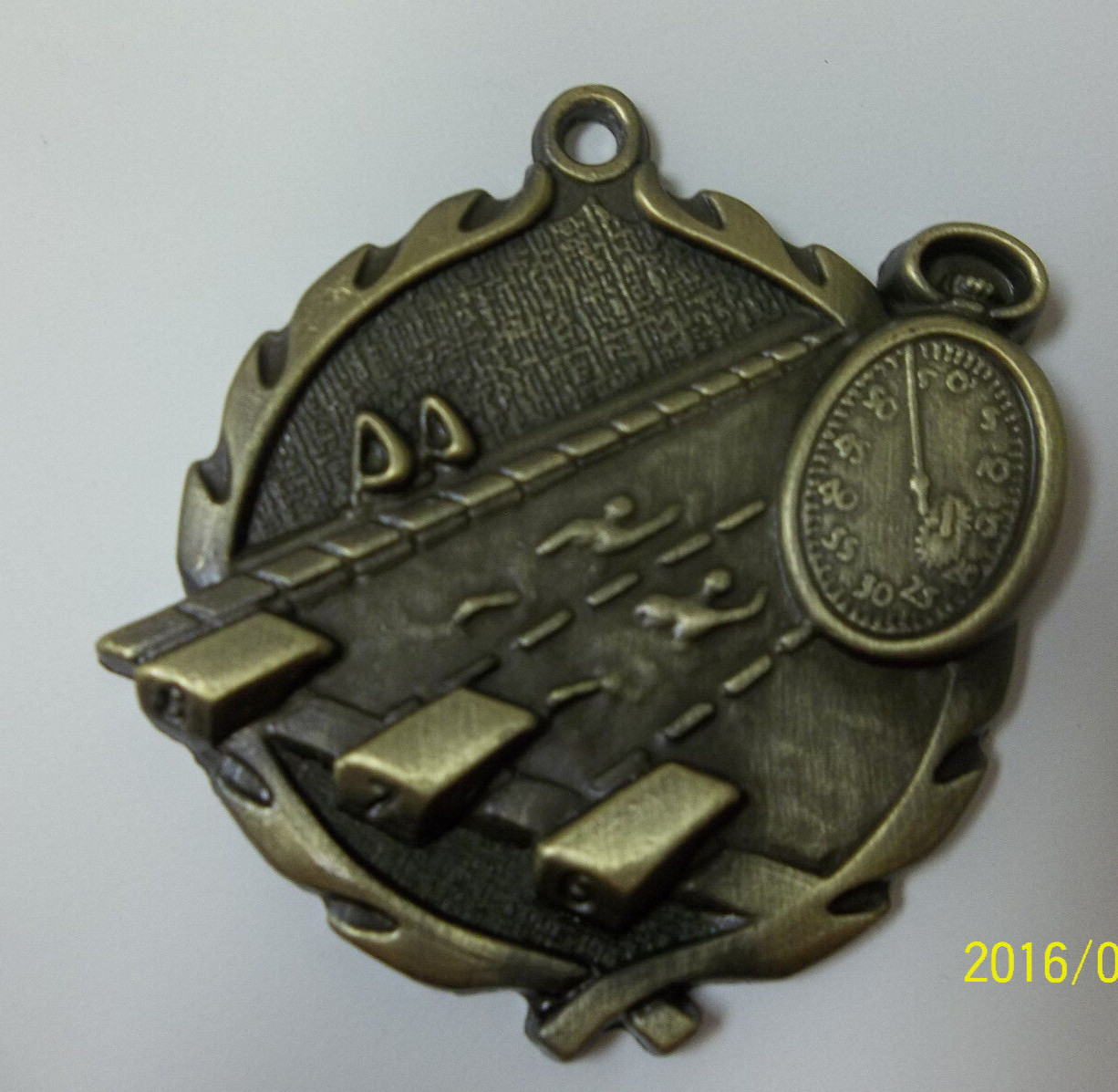 Swimming gold medal, w/ engraving, 1.75",  w/ R, W & B ribbon
