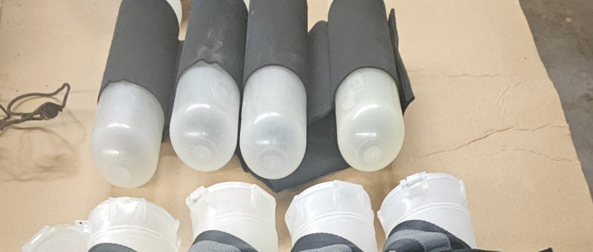 PRE-OWNED, FAIRLY NEW/CLEAN, PAINTBALL TUBES WITH ELASTIC BELT