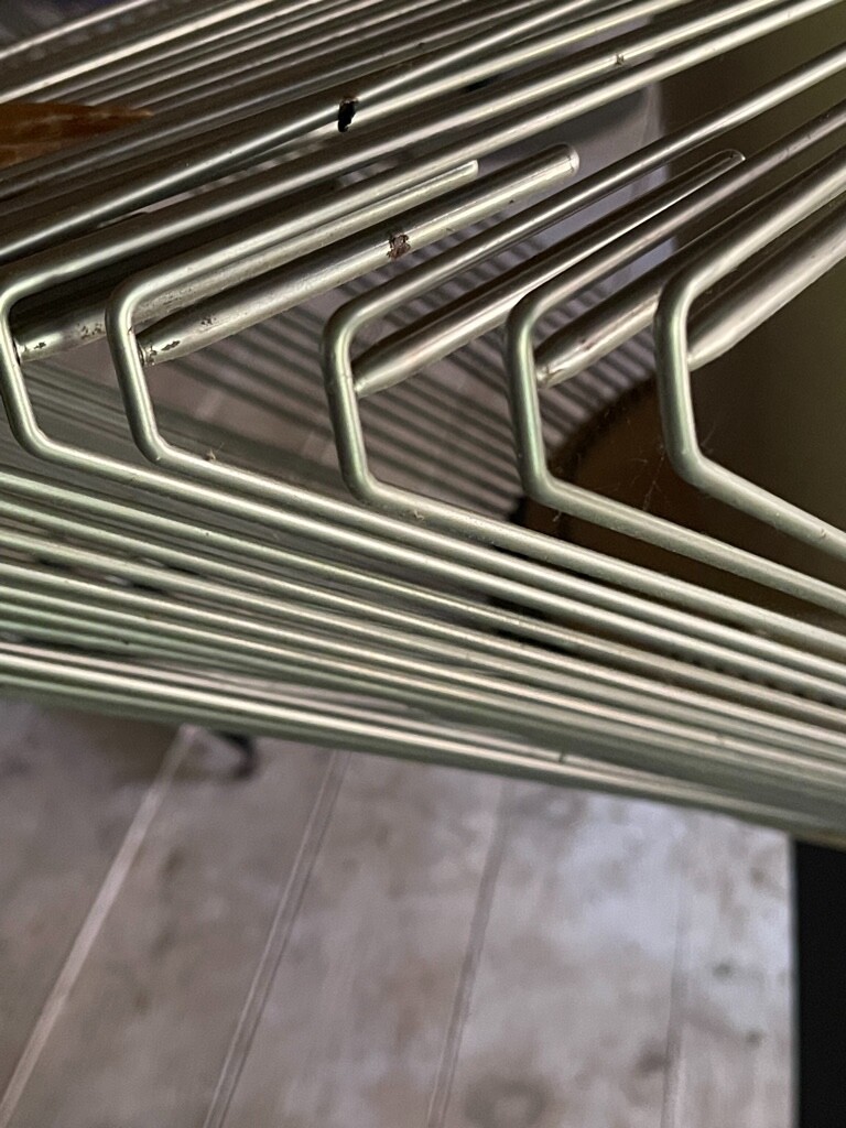 Display stand for selling clothing holds 100? pair of pants,neat, orderly, spins