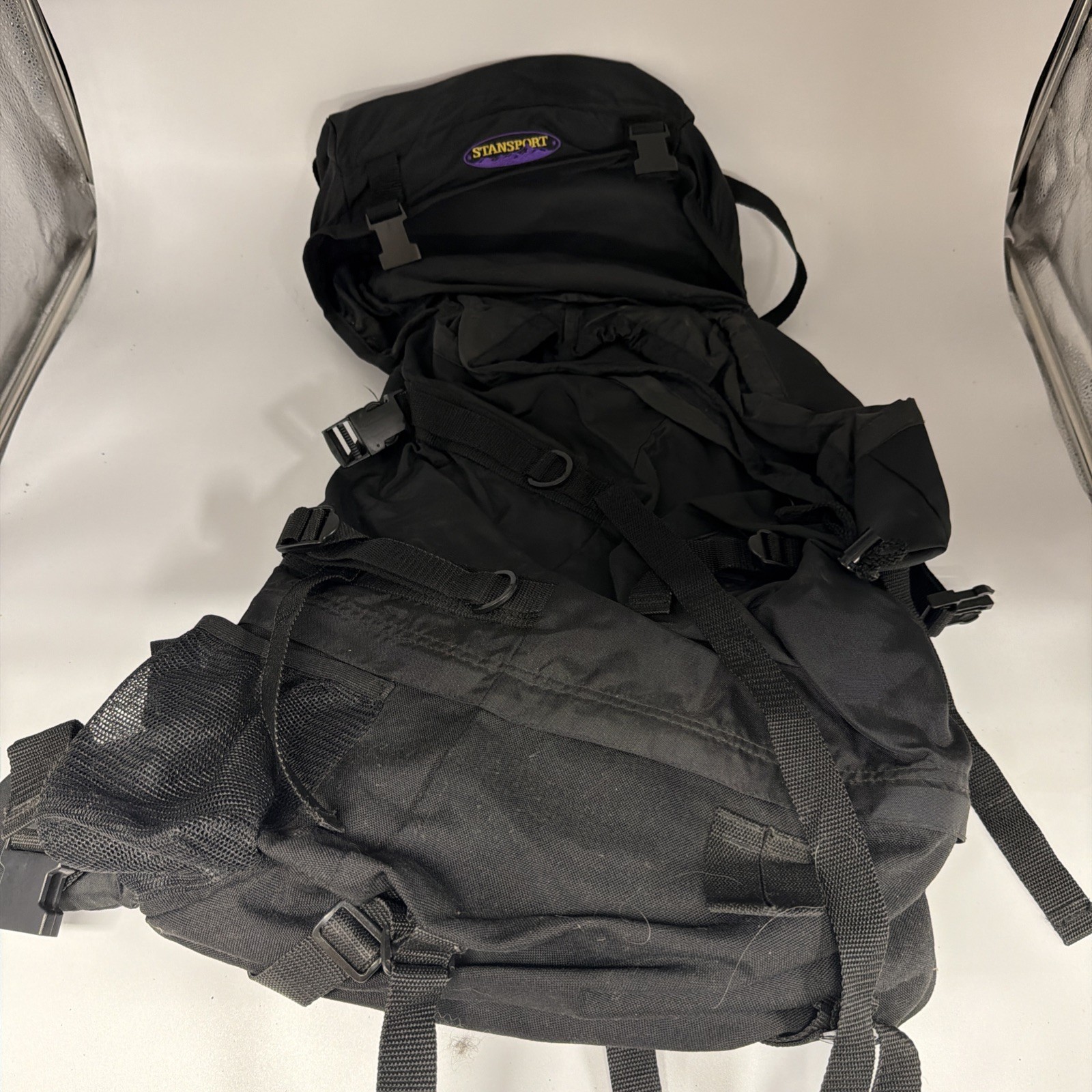 black Stansport hiking backpack features external adjustable straps
