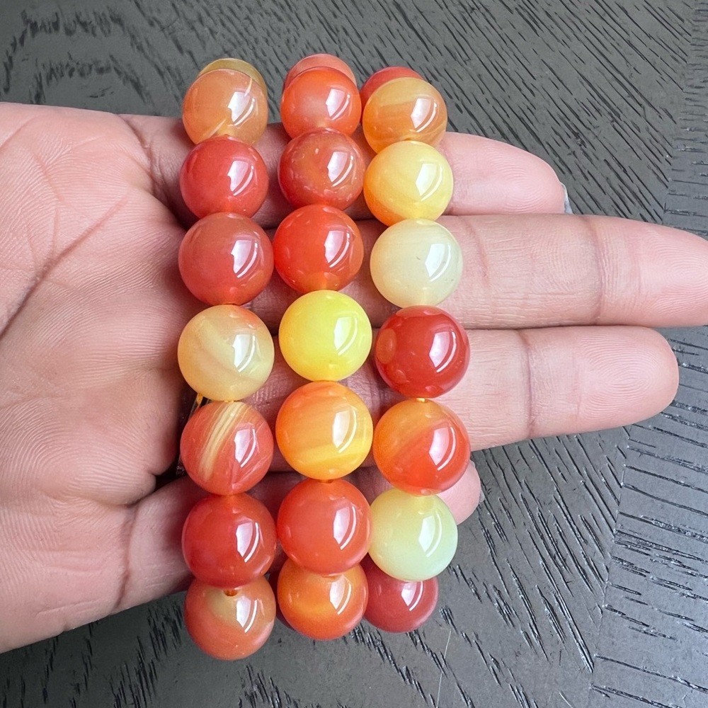 Orange agate bracelet 12mm 6.5’ (one)