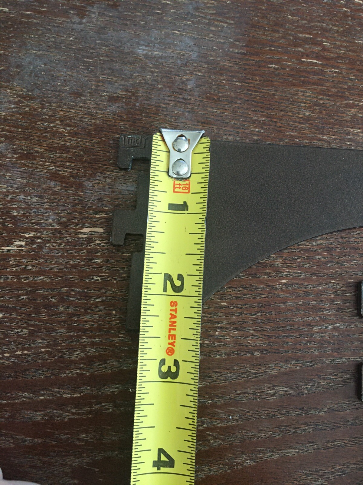 2 brown metal shelf support arms 8" after Slotted.