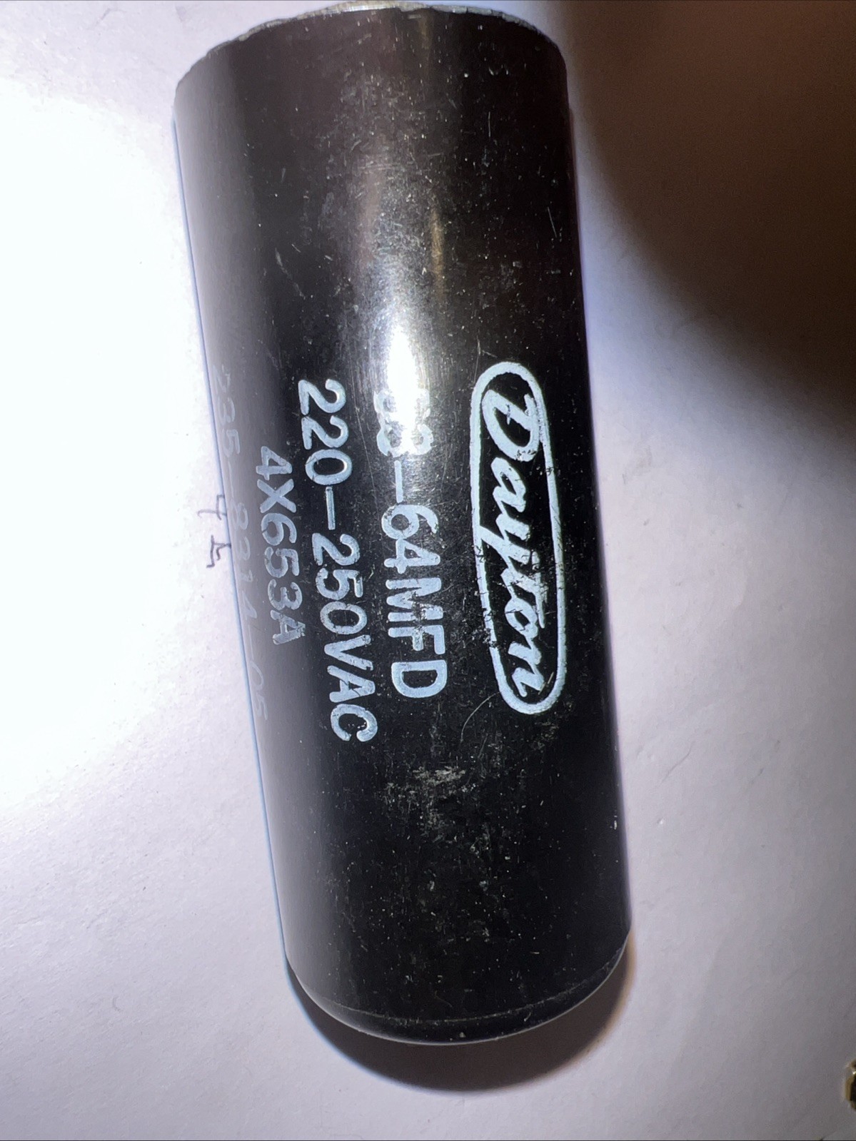 Dayton motor start capacitor 53-64 MFD 220-250 VAC Part Number 4X653A