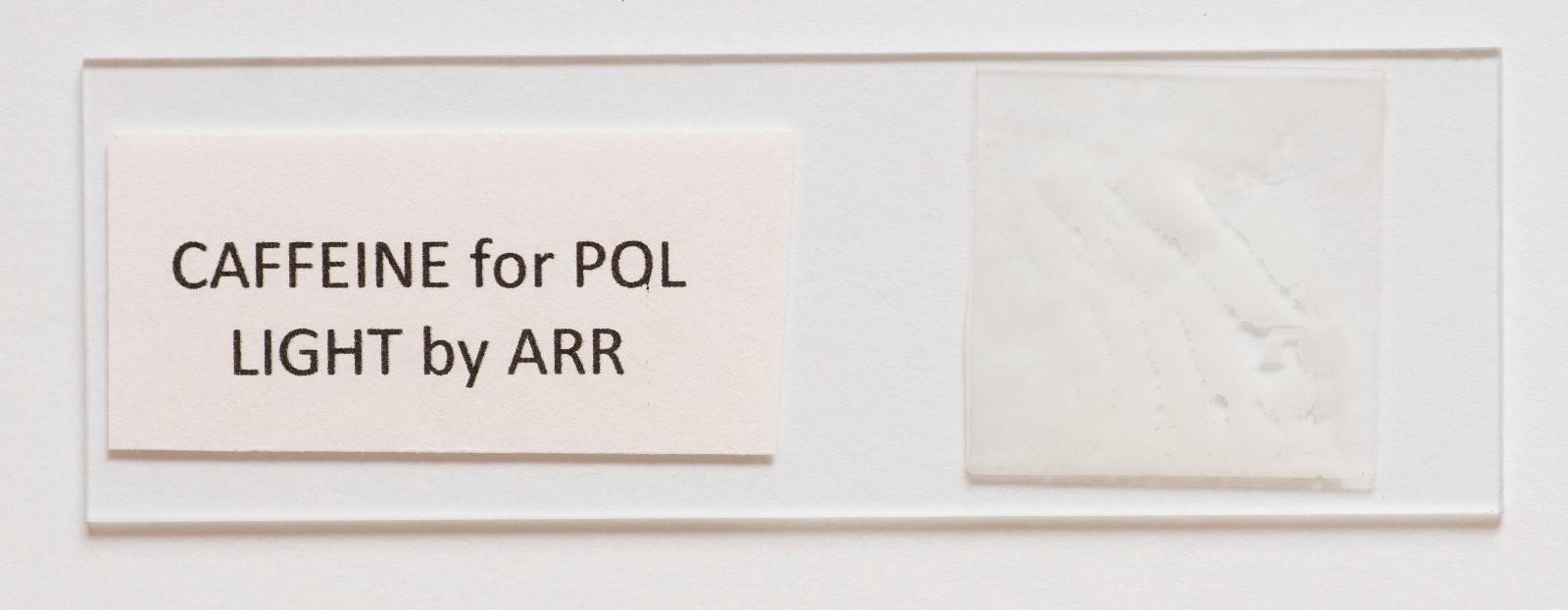 Microscope slide for polarized light, Caffeine