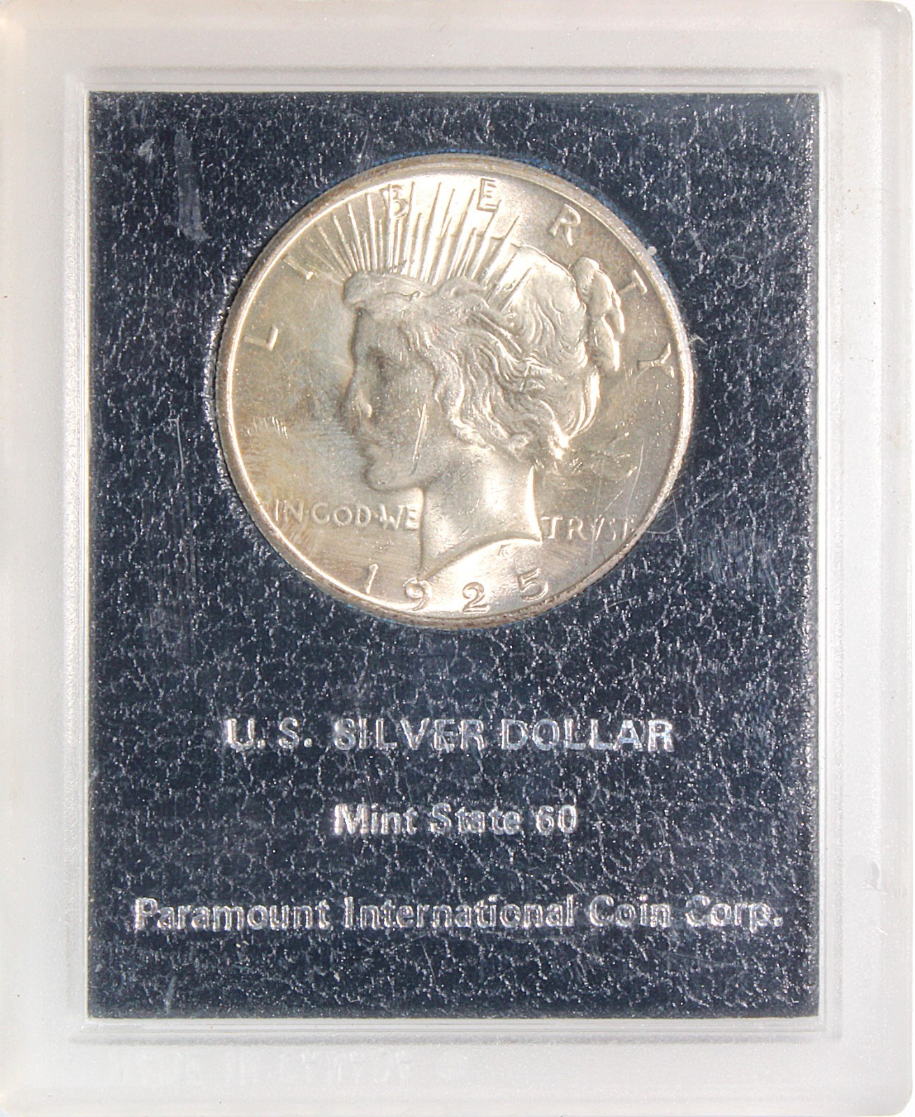 1925 PEACE SILVER DOLLAR PARAMOUNT INTERNATIONAL HOLDER--LIGHT TONING