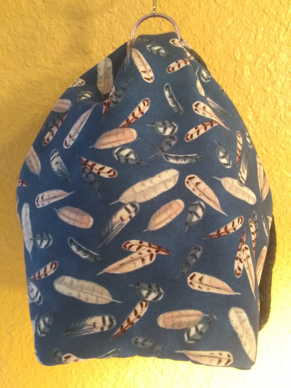 Bird Beds. Blue with feather designs.