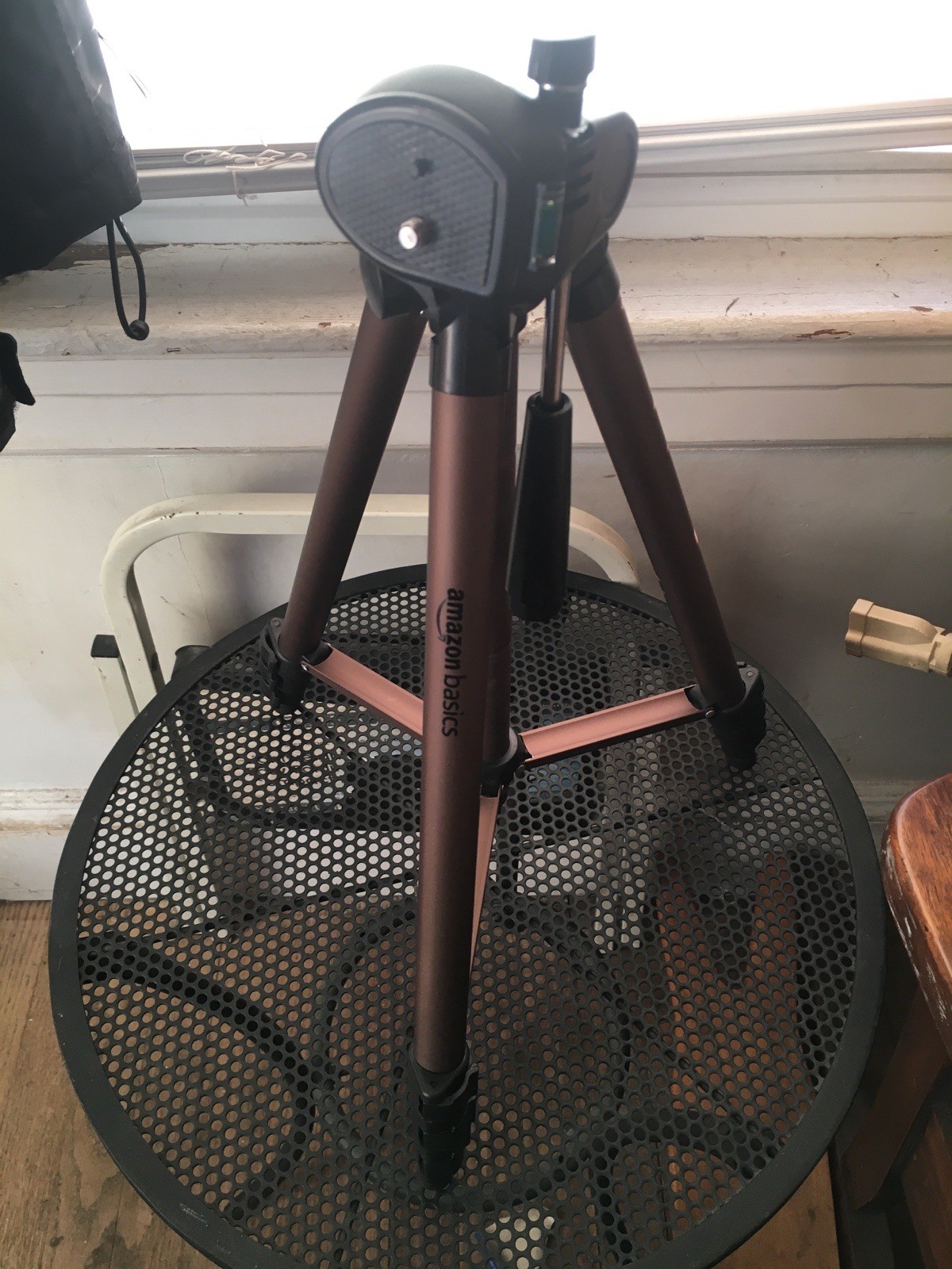 Amazon Basics 50-inch Lightweight Portable Camera Mount Tripod Stand.