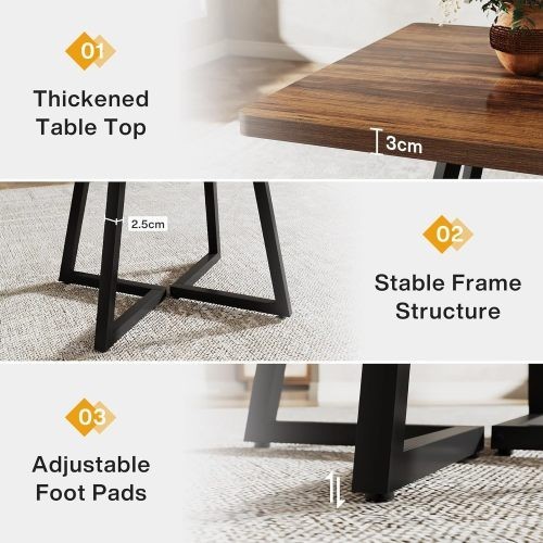 Dining table A brown industrial kitchen table with a black metal frame
