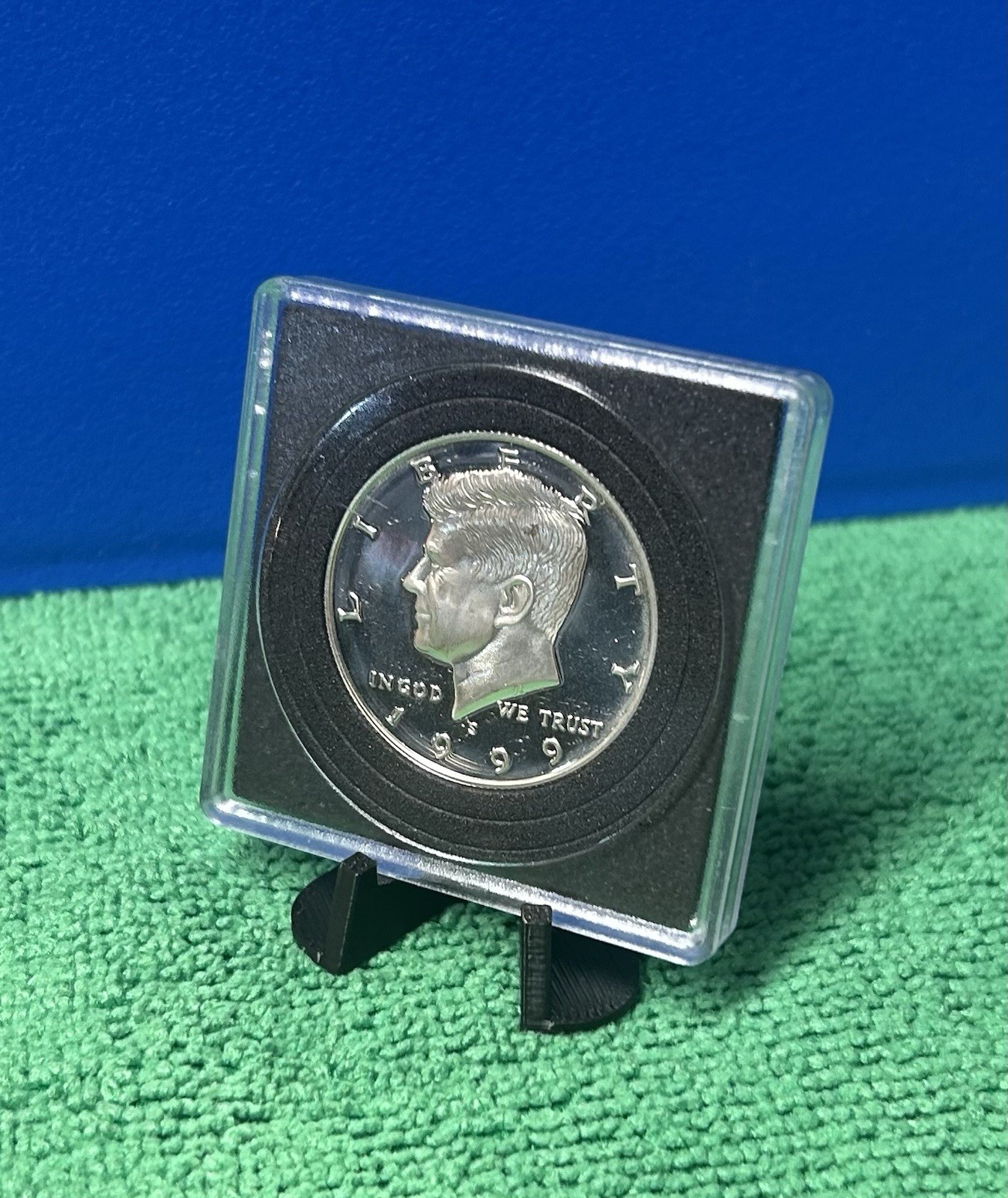1999-S SILVER PROOF KENNEDY HALF in a plastic holder with stand for displaying