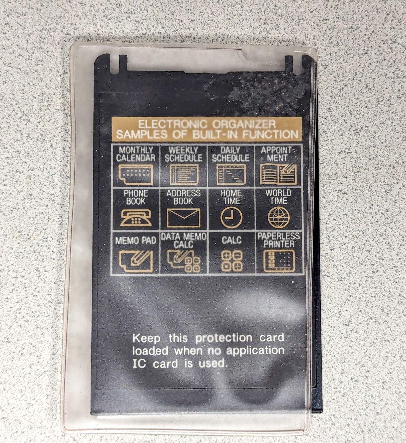 Sharp Wizard OZ-7000 Electronic Organizer with Time & Expense Manager Card