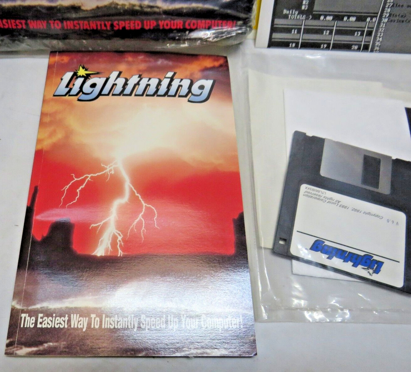 Lightning Version 6.0 on 3.5" disk with manual and pictured book new opened box