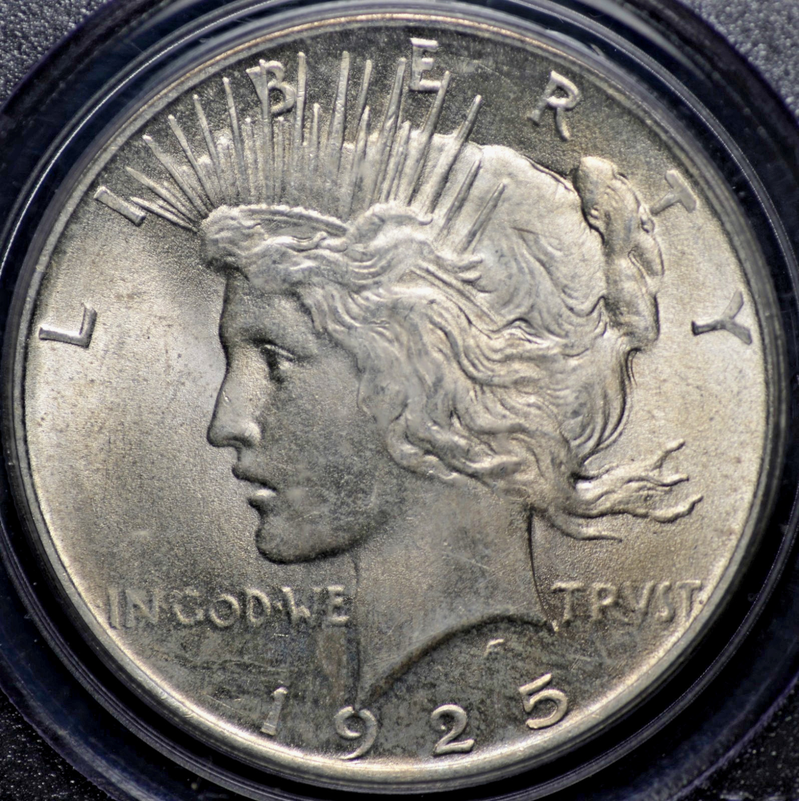 1925 PEACE DOLLAR PCGS MS 64 SMOOTH AND WELL STRUCK, WITH A LIGHT ORIGINAL VEIL