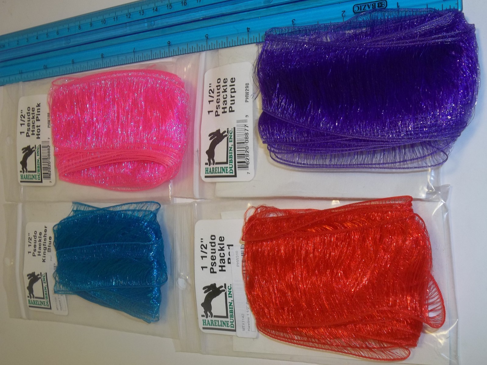 Hareline Pseudo hackle 1.5" white, red, purple, orange pink blue