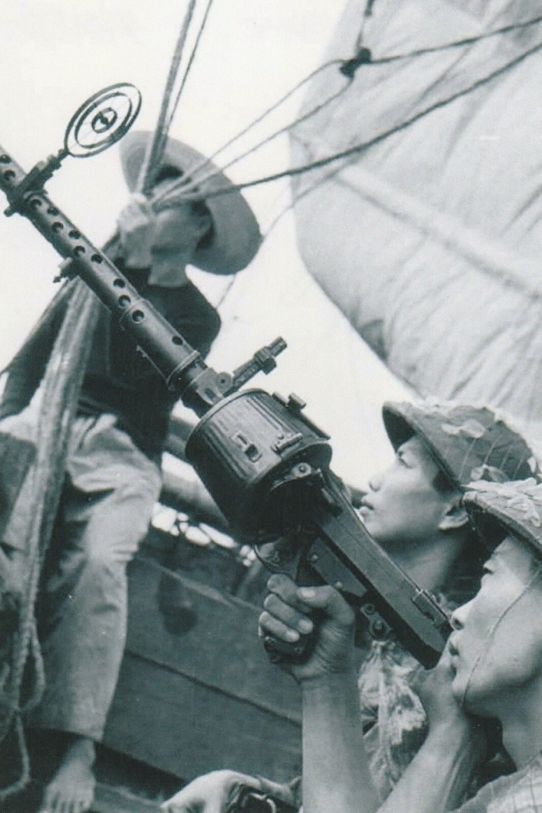Vietnam  War  Photos --   North Vietnamese Soldier With Anti-Aircraft Gun