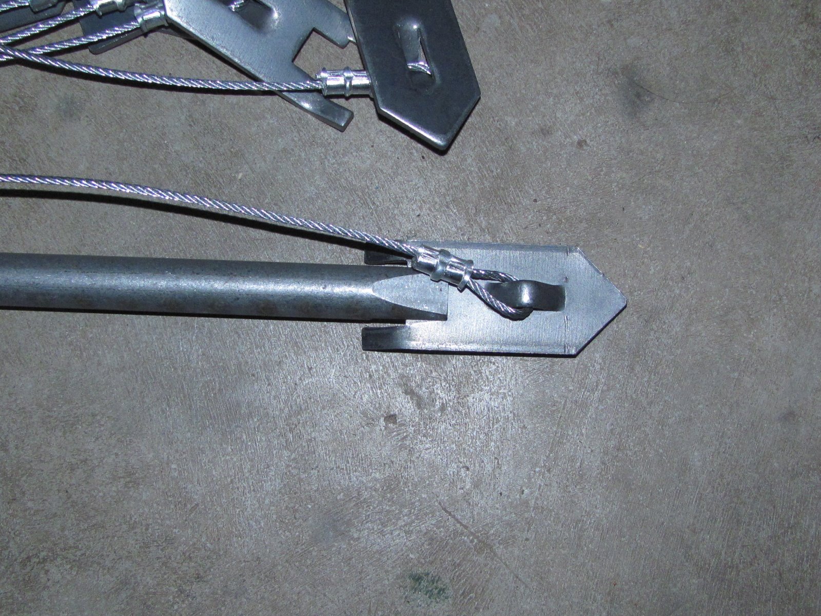 1 Dozen WOLF FANG ANCHORS w/ 18" CABLE & DRIVER, trapping stakes, traps, coyote