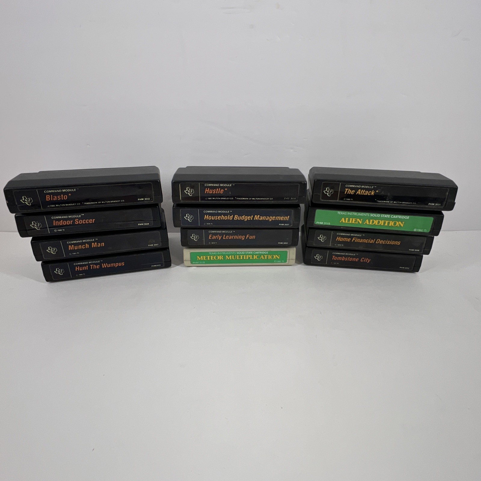 TI-99/4A Command Module 12 Game Lot Hustle Blasto Munch Man Cartridges UNTESTED