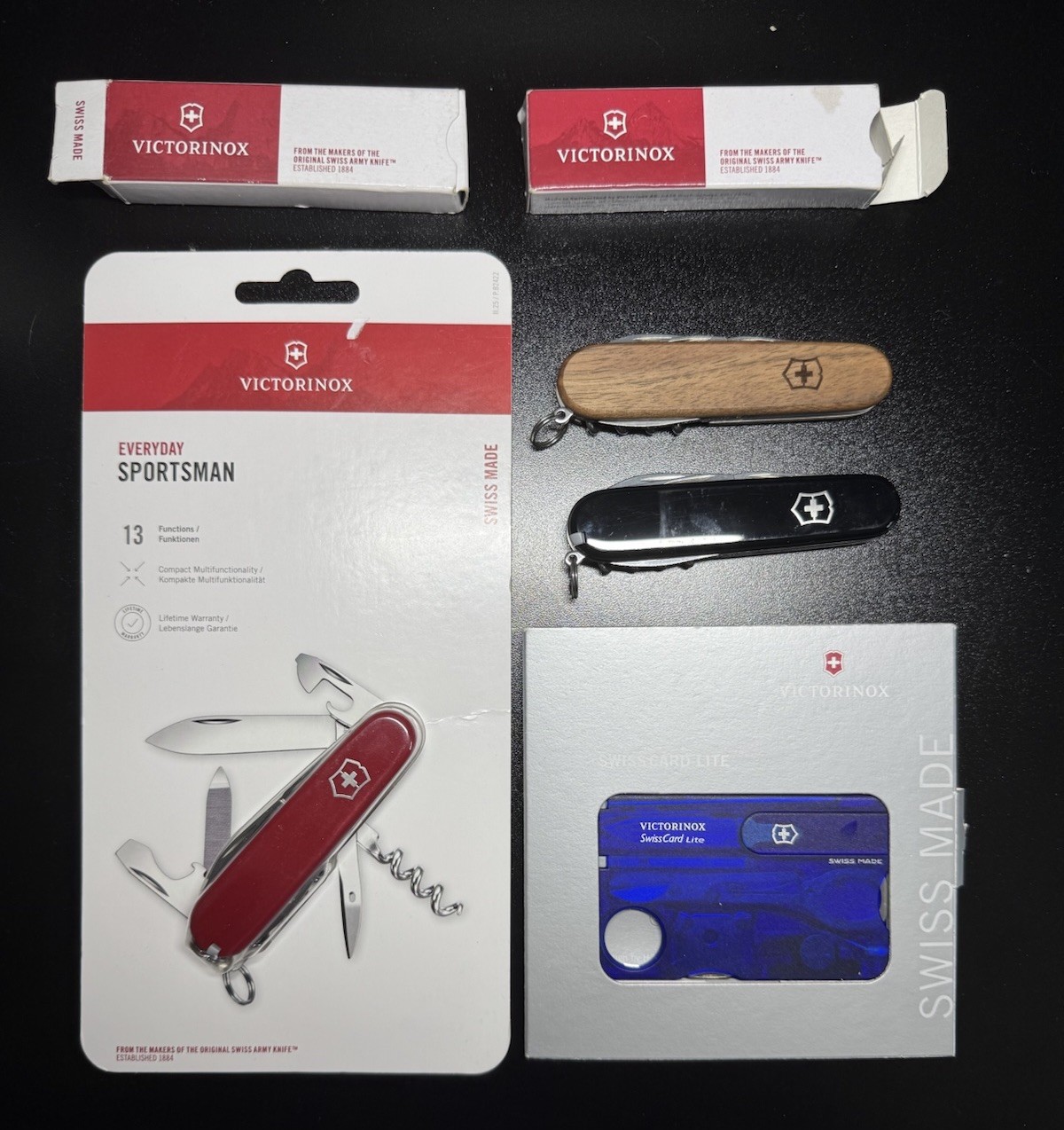 Lot Of 4 Victorinox (Sportsman, Spartan, Spartan Wood, & Swiss Card Lite)