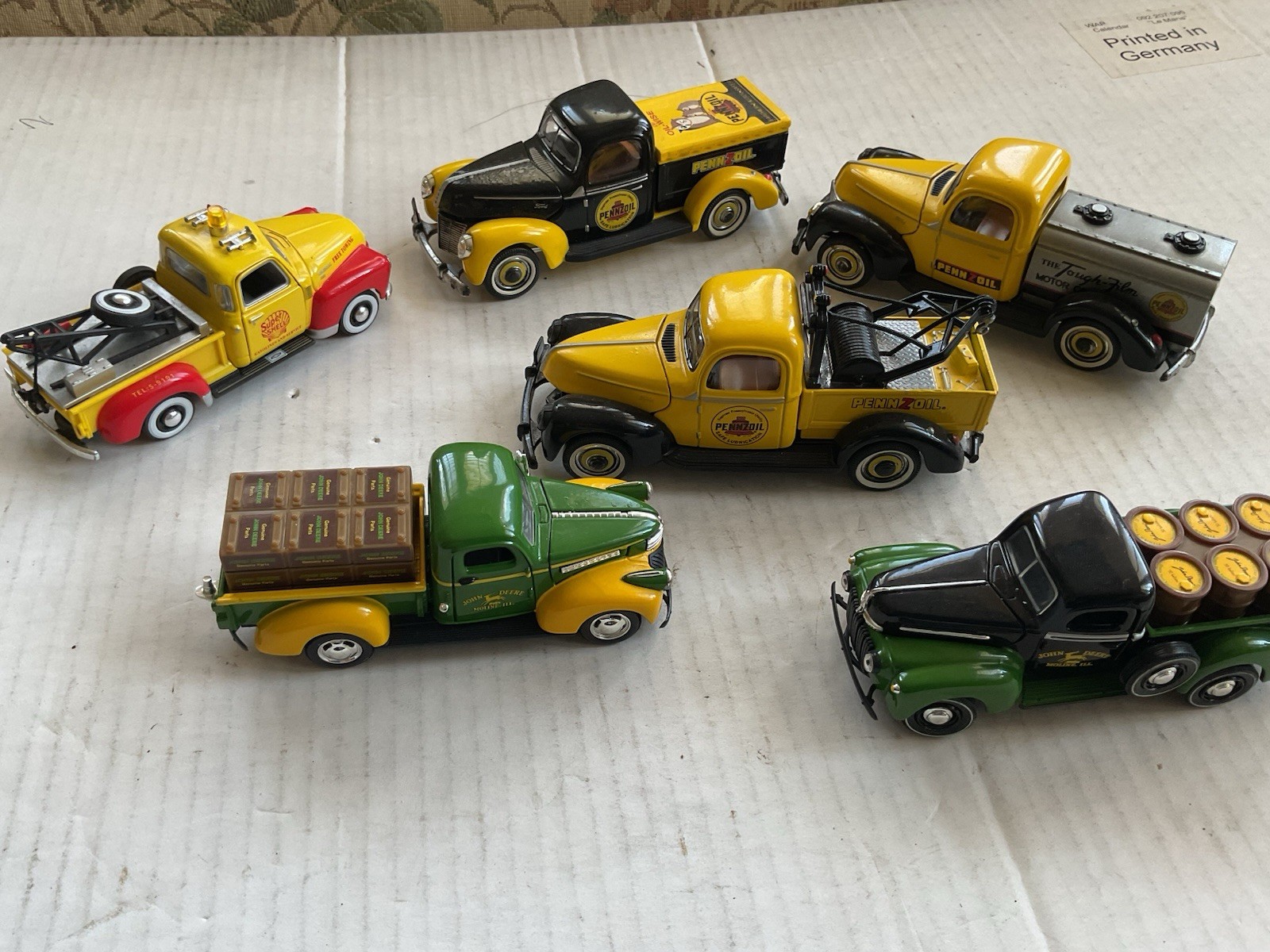 John Deere Trucks And. Pennz Oil Trucks