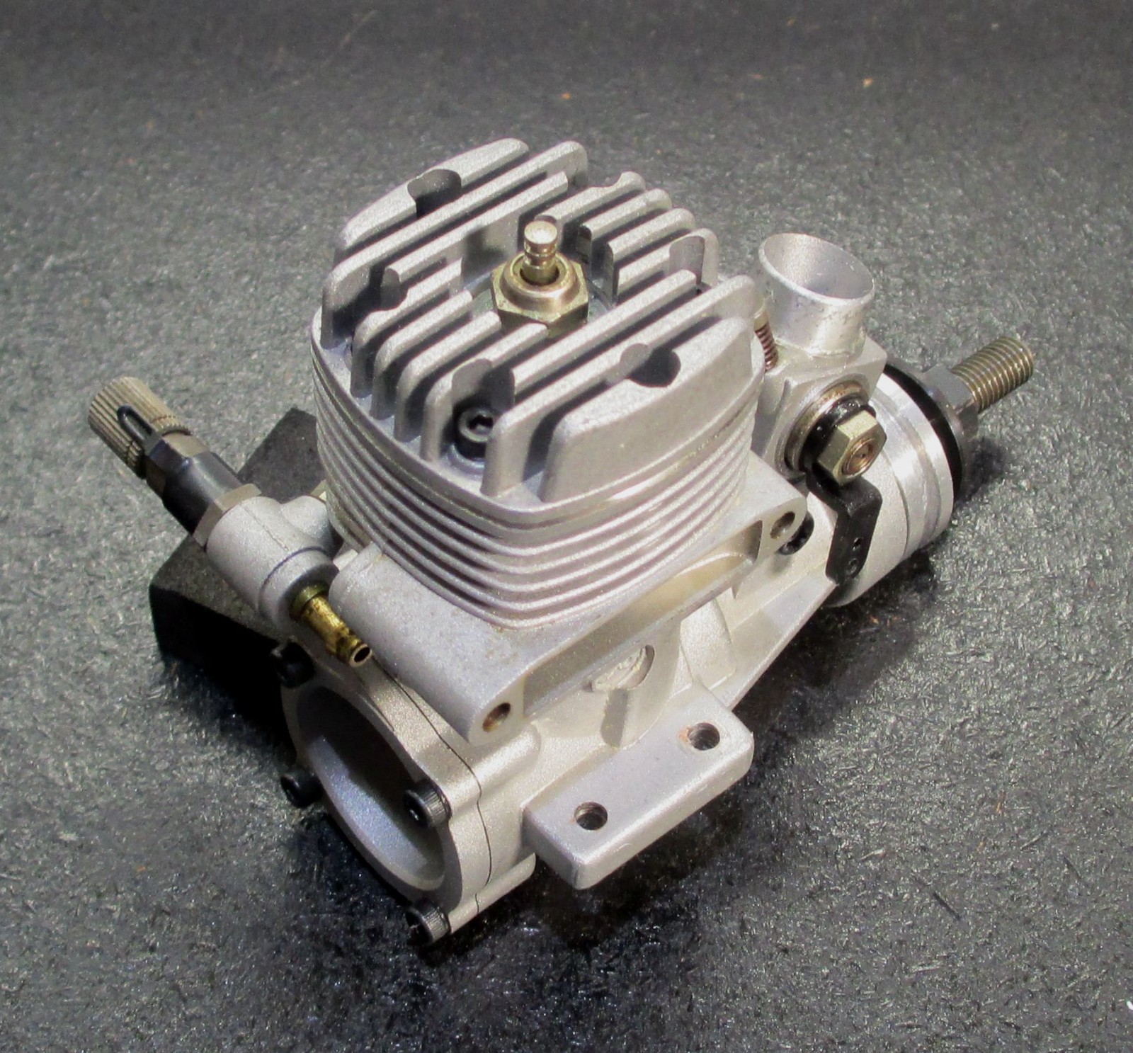 O.S. MAX-25FX 4.07cc 2-Stroke Glow Engine Includes muffler; used for RC airplane