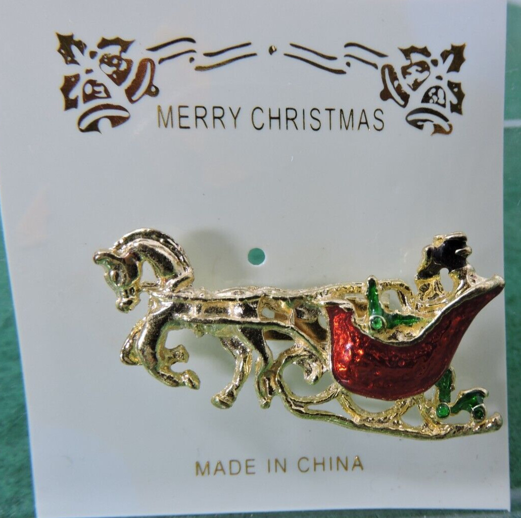 Enamel horse and sleigh christmas pin