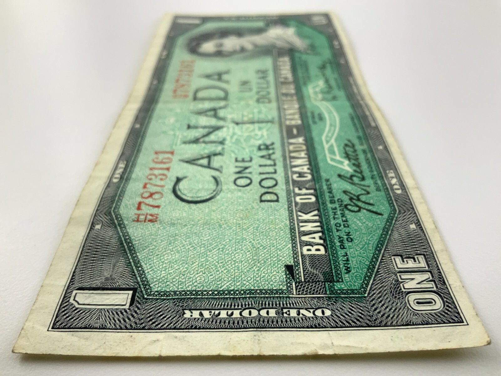 1954 Canada 1 One Dollar Circulated Banknote HM Prefix Beattie Rasminsky Y672
