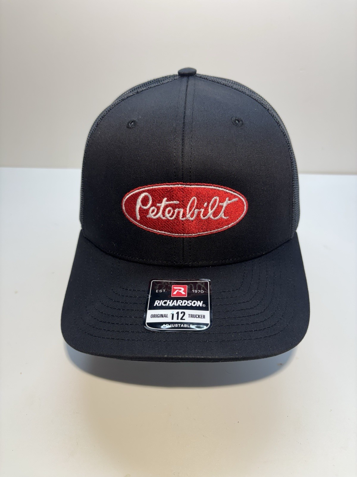 Peterbilt Truck Black Richardson 112, SnapBack, Trucker Hat, Embroidered Logo.