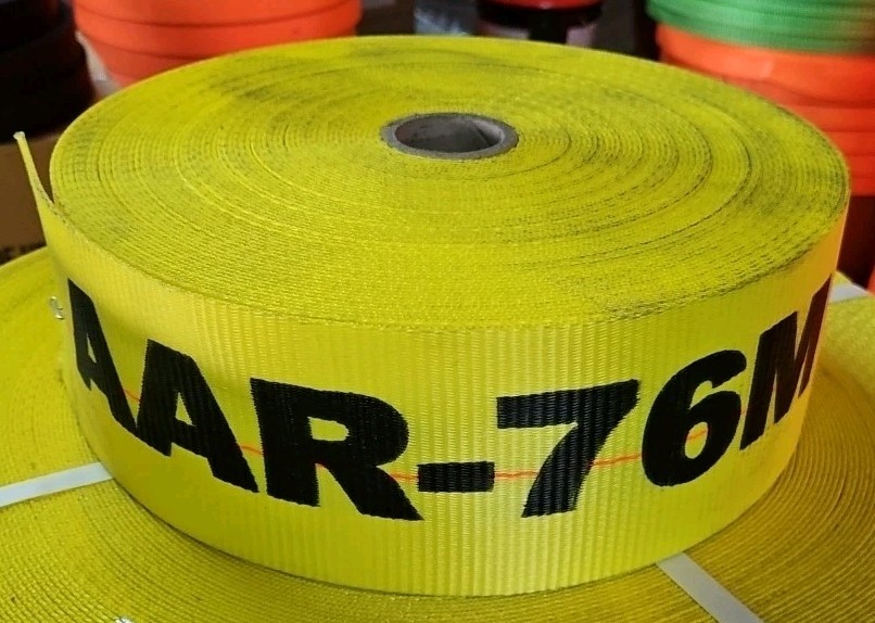 110' Roll of 4" Yellow w/ Orange Center Stitch & Black Edging Tie Down Webbing