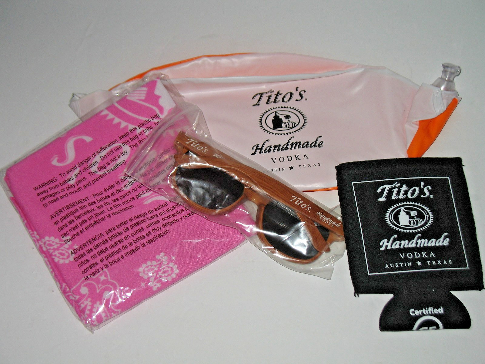 TITO'S HANDMADE VODKA - 4 PIECE LOT- BEACHBALL, KOOZIE, PINK BANDANA, SUNGLASSES