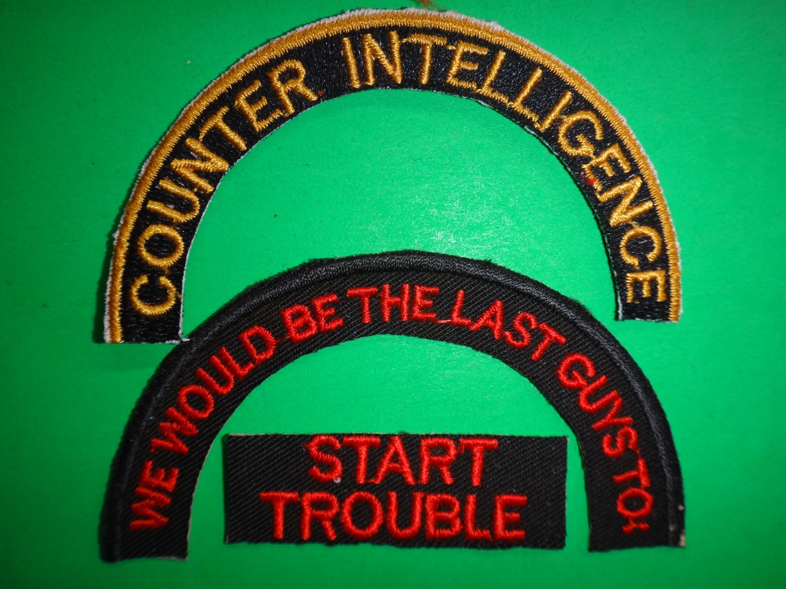 Slogan COUNTERINTELLIGENCE WE WOULD BE THE LAST GUYS TO START TROUBLE Patches