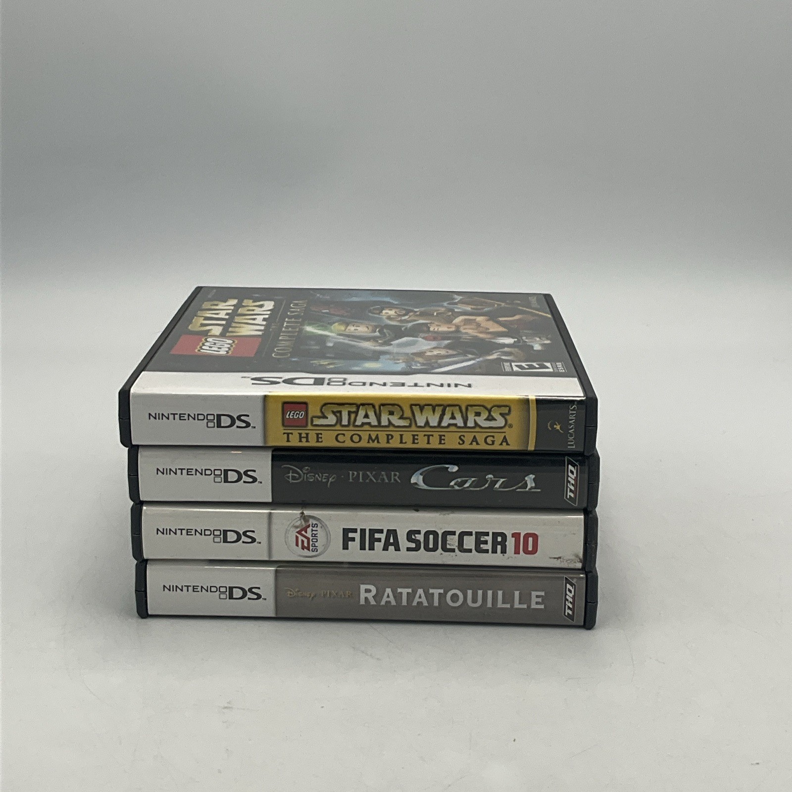 Lot of (4) Nintendo DS CASES AND MANUALS ONLY, FIFA, Cars, Star Wars, Ratatouill