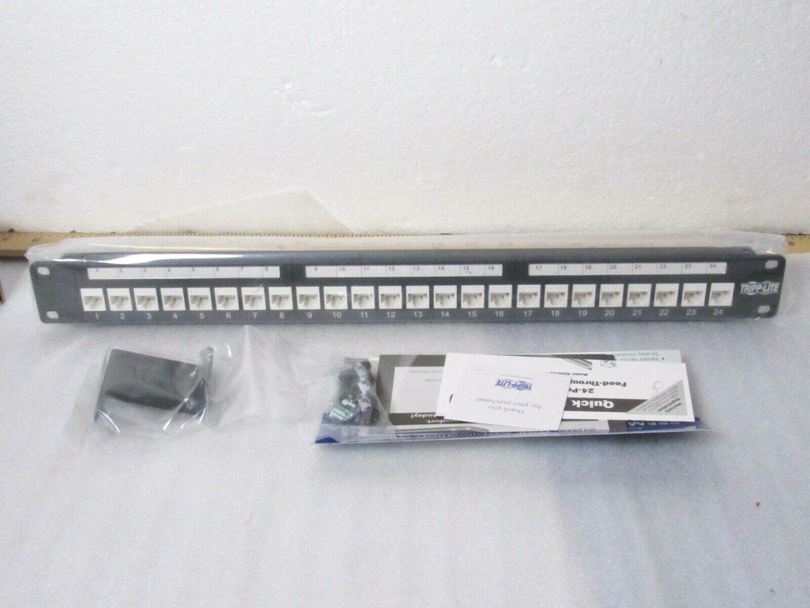 Tripp-Lite N250-024-LP 24-Port Cat6/Cat5 Low Profile Patch Panel Feed Thru [CTA]