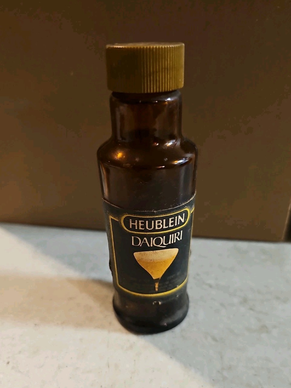 Vintage HEUBLEIN Daiquiri Empty Miniature Amber Bottle Delta Airlines Sticker
