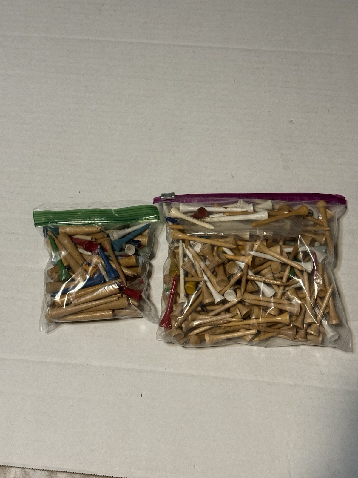 collection of assorted wooden golf tee’s