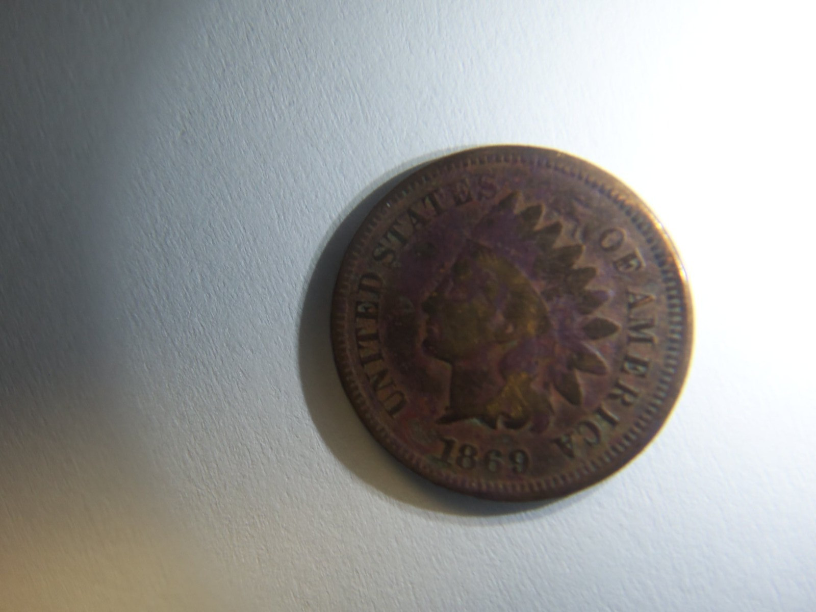 A RARE 1869 INDIAN HEAD PENNY