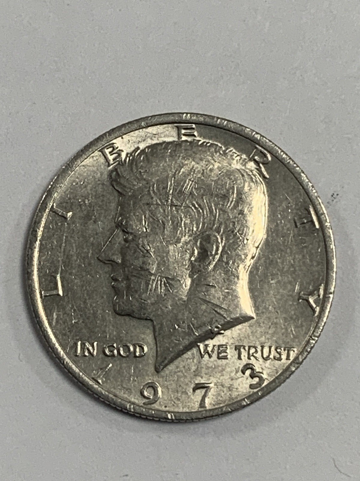 1973 Kennedy Half Dollar, Double Die Reverse on “Half Dollar”