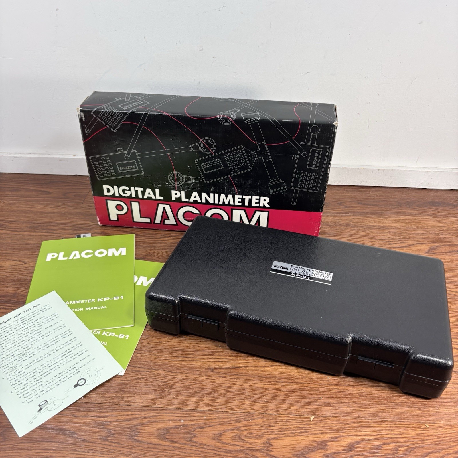Placom Digital Planimeter Model KP-81, Hard Case, Power Adapter, & Manual
